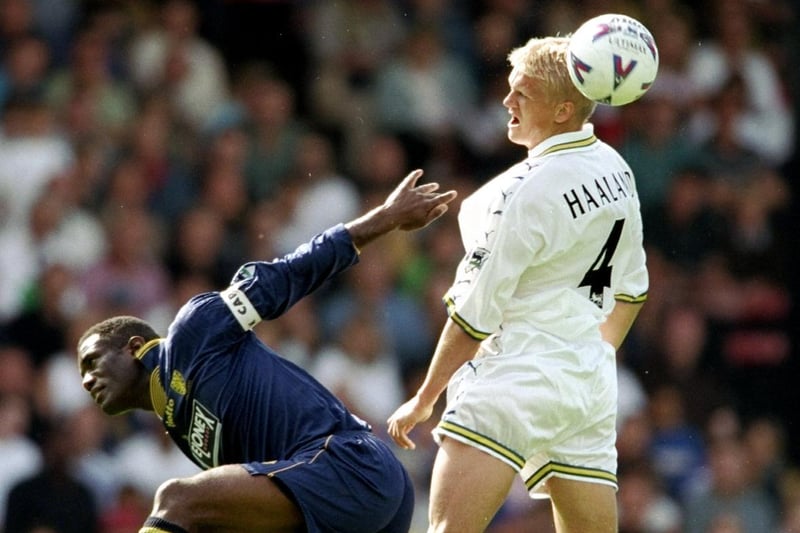Alf-Inge Haaland beats Wimbledon captain Robbie Earle to the ball during the Premier League clash at Selhurst Park in August 1998. The game finished 1-1.
