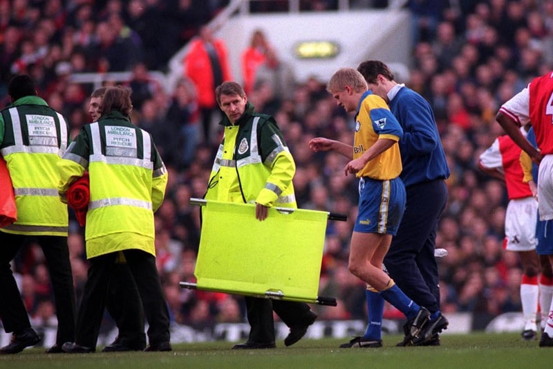 Alf_Inge Haaland leaves the field against Arsenal at Highbury in December 1998 after picking up an injury. The Gunners won 3-1.