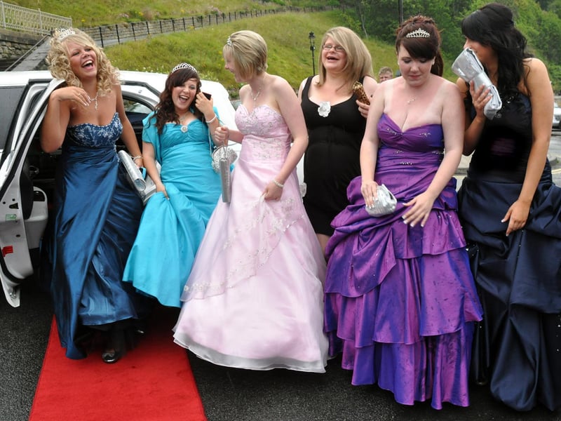 Party goers arrive in style in a stretch limo.