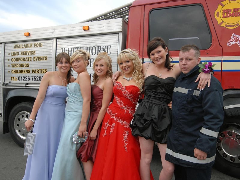A group arrive by an unusual vehicle.