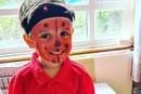 Freddie Austin, 5, dressed as a ladybird for his 'ugly bug ball'.
