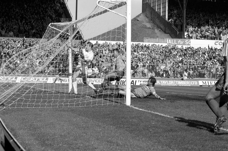 Lee Chapman slots home Leeds United's second with  the easiest of finishes inside the six-yard box.