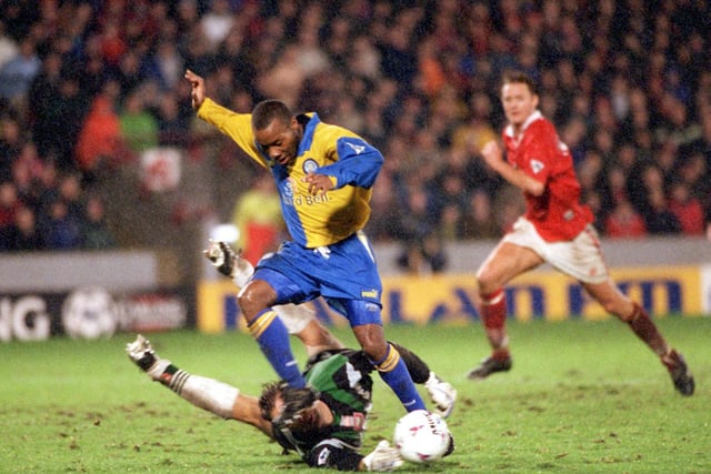 Rod Wallace takes the ball around Barnsley goalkeeper Lars Leese who manages to get his fingers to the ball and push it away from the striker during the Premier League clash at Oakwell in November 1997.