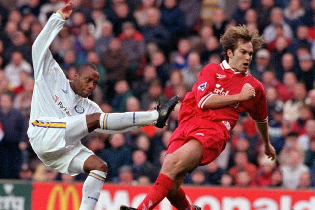 Rod Wallace powers the ball past Liverpool's Jason McAteer during the Premier League clash at Anfield in December 1997. The Whites lost 3-1.