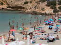 IBIZA: Tourists enjoy a sunny day at Cala Tadira beach. Photo: Getty Images