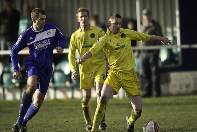 Paul Nodder shields the ball from Danny Torotra in Glasshoughton Welfare's 2-0 derby win away to Hemsworth MW.