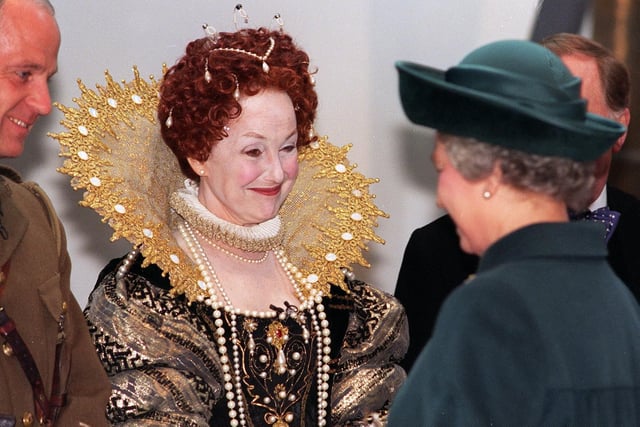 Una Stubbs, in a costume of Queen Elizabeth 1, meets Queen Elizabeth 2 during her visit to Leeds for the opening of The Royal Armouries on the 15 March 1996.