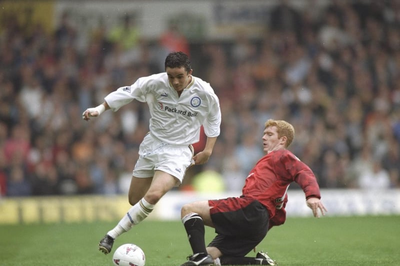Gary Kelly evades a challenge from Manchester United's Paul Scholes.