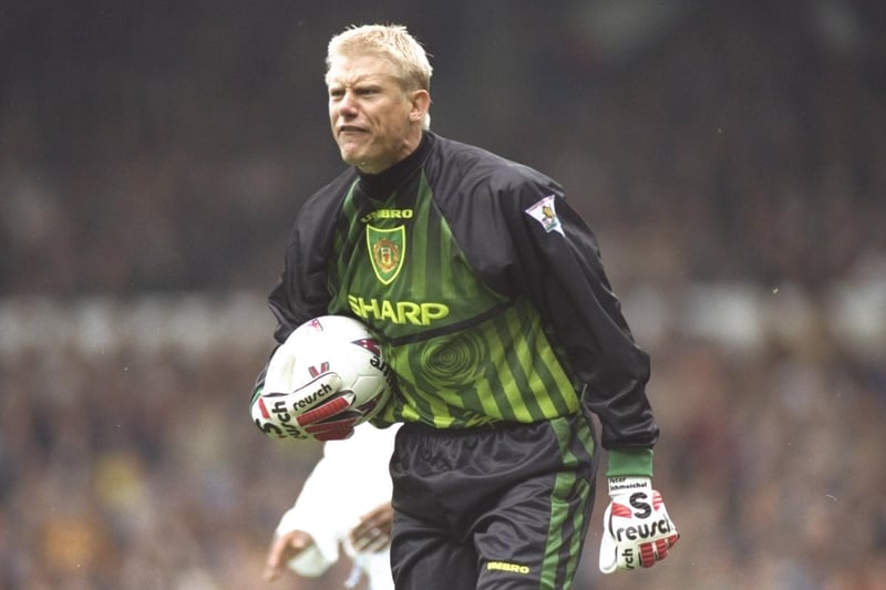 Manchester United goalkeeper Peter Schmeichel barks out orders to his teammates.