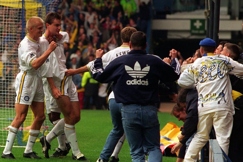 David Wetherall celebrates his goal with the Elland Road faithful.
