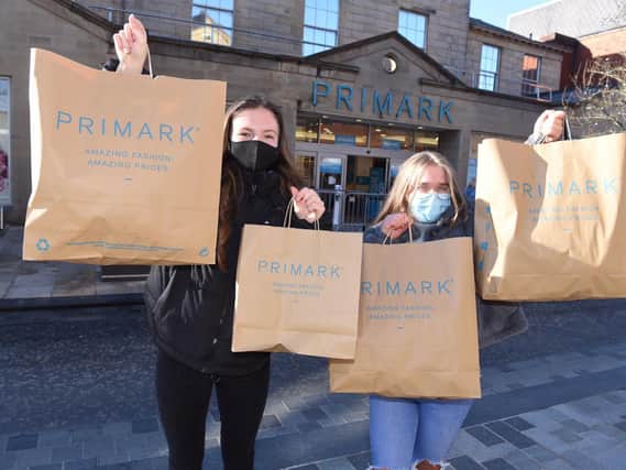 Shop 'till you drop: Customers outside the newly reopened Primark store in Preston