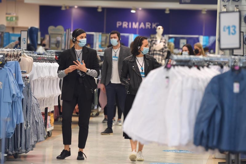 Staff at Primark get ready to welcome customers