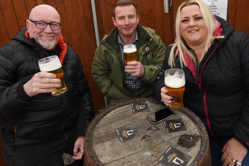 Customers enjoy their first hand-pulled pint of 2021 in the beer garden of The Albion Ale House, Standish.