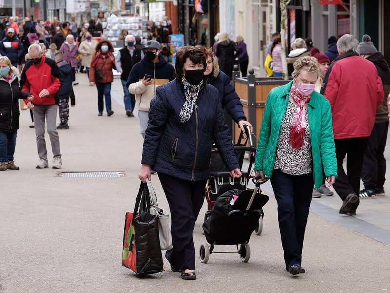 Shoppers spill out onto the high street as retailers, pubs and hairdressers reopened.