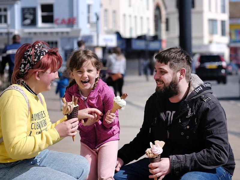 Enjoying an ice cream on the seafront in the sunshine...