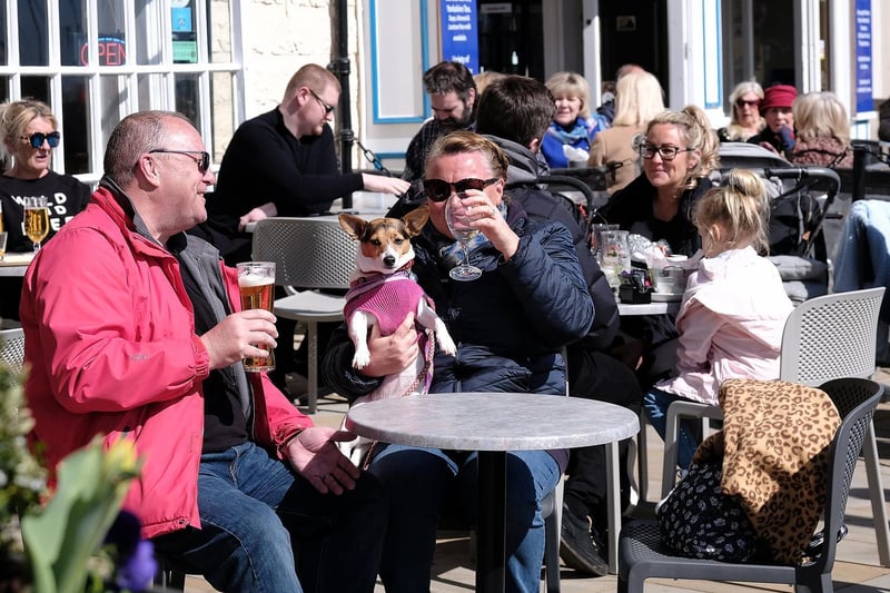 Customers enjoy a pint in the sunshine on the seafront at The King Richard III.