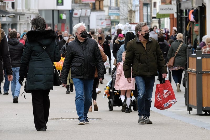 Shoppers spill out onto the high street as retailers, pubs and hairdressers reopened.