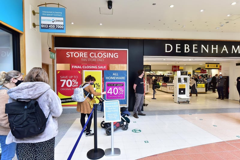 Shoppers queue to get some bargains from Debenhams in the Brunswick Shopping Centre.