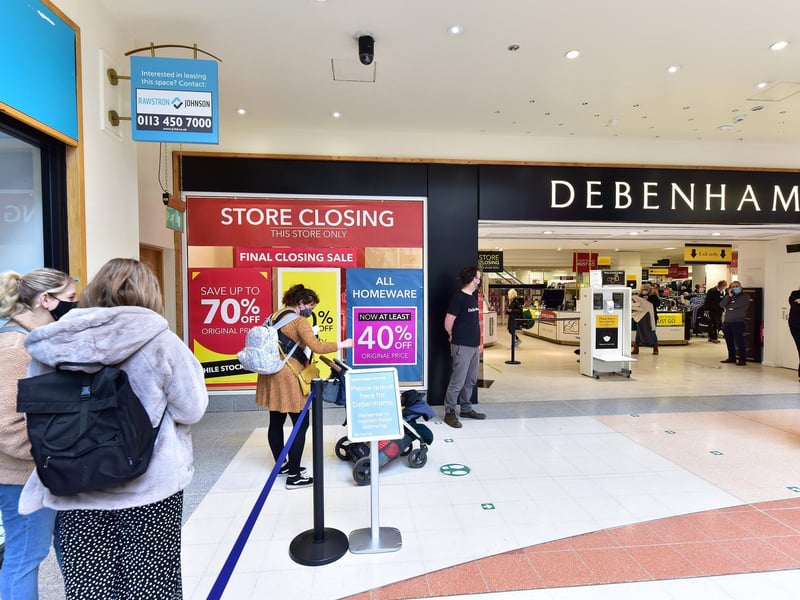 Shoppers queue to get some bargains from Debenhams in the Brunswick Shopping Centre.
