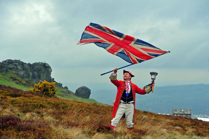 3 May 2015.......           Harrogate town cryer Simon Shaw ready for the riders on the Tour de Yorkshire on the Cow and Calf in Ilkley on Stage 3. TJ100823q Picture by Tony Johnson