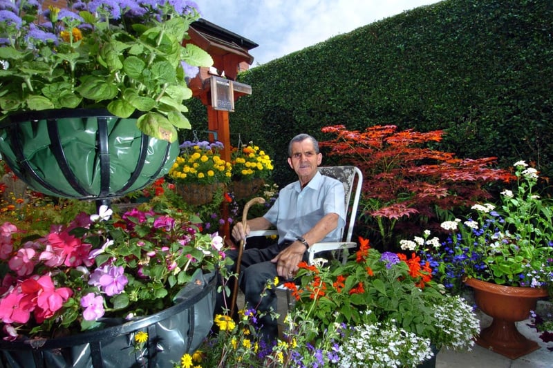 July 2006 and pensioner Raymond Tofts helped raise funds for St Gemma's Hospice by opening his garden in Garforth to the public.