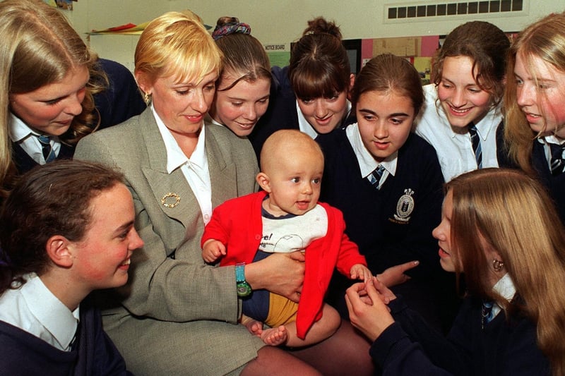 Year ten GCSE Child Development Studies students at Prince Henry's are livened up baby Douglas Ellis in June 1997. He is pictured with mum, English teacher Sian Ellis.