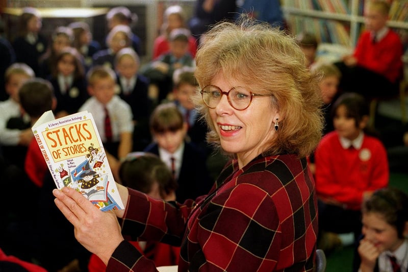 Childrens librarian Mary Ashton reads the book Stacks of Stories to pupils at Otley Library as part of National Libraries Week in November 1997.