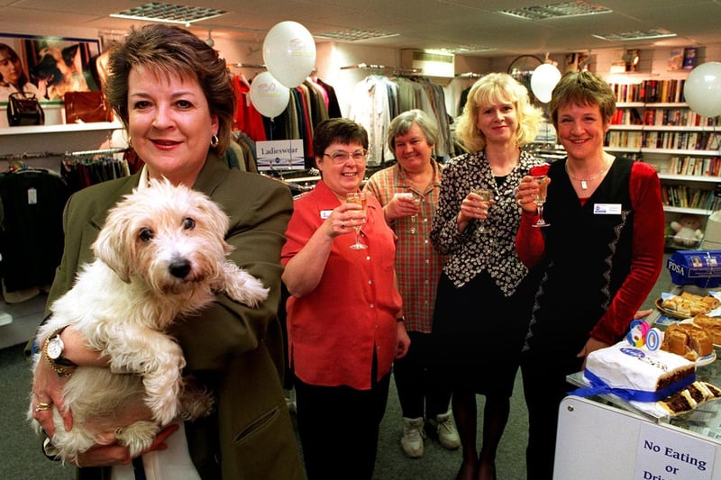 Helen Oxley and her dog Lucy celebrate the PDSA's 80th birthday with staff at their shop in Otley. Also pictured are Jean Richens, Jean Payne, Beverley Wharrier and Jane Currie.