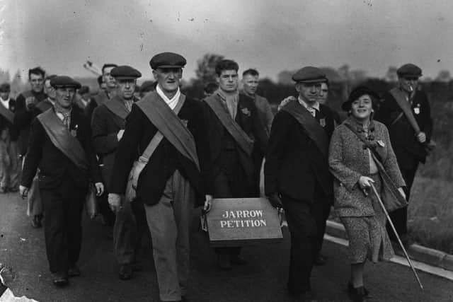 A group of protesters carrying the petition on the Jarrow Crusade.  (Photo by Fox Photos/Getty Images)