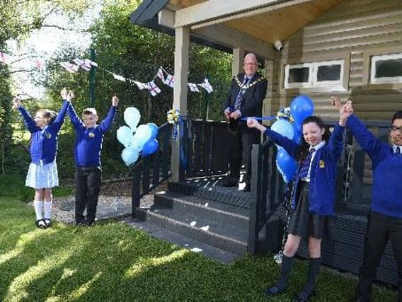 Mayor David Borrow cuts the ribbon at The Burrow, photo: Neil Cross.