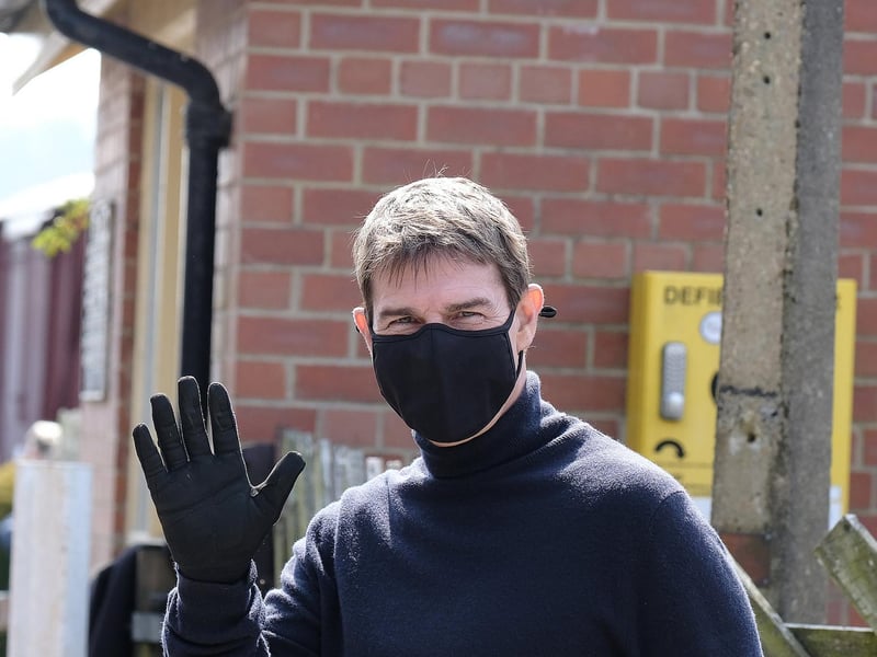 Tom Cruise was only too happy to wave for reporters in Levisham.