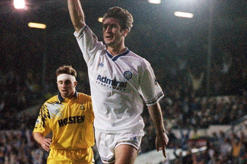 Eric Cantona celebrates scoring.