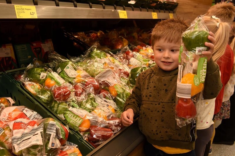 Leyland boy James checks out the fresh fruit and veg at the new Aldi store during its grand opening this morning (May 6)