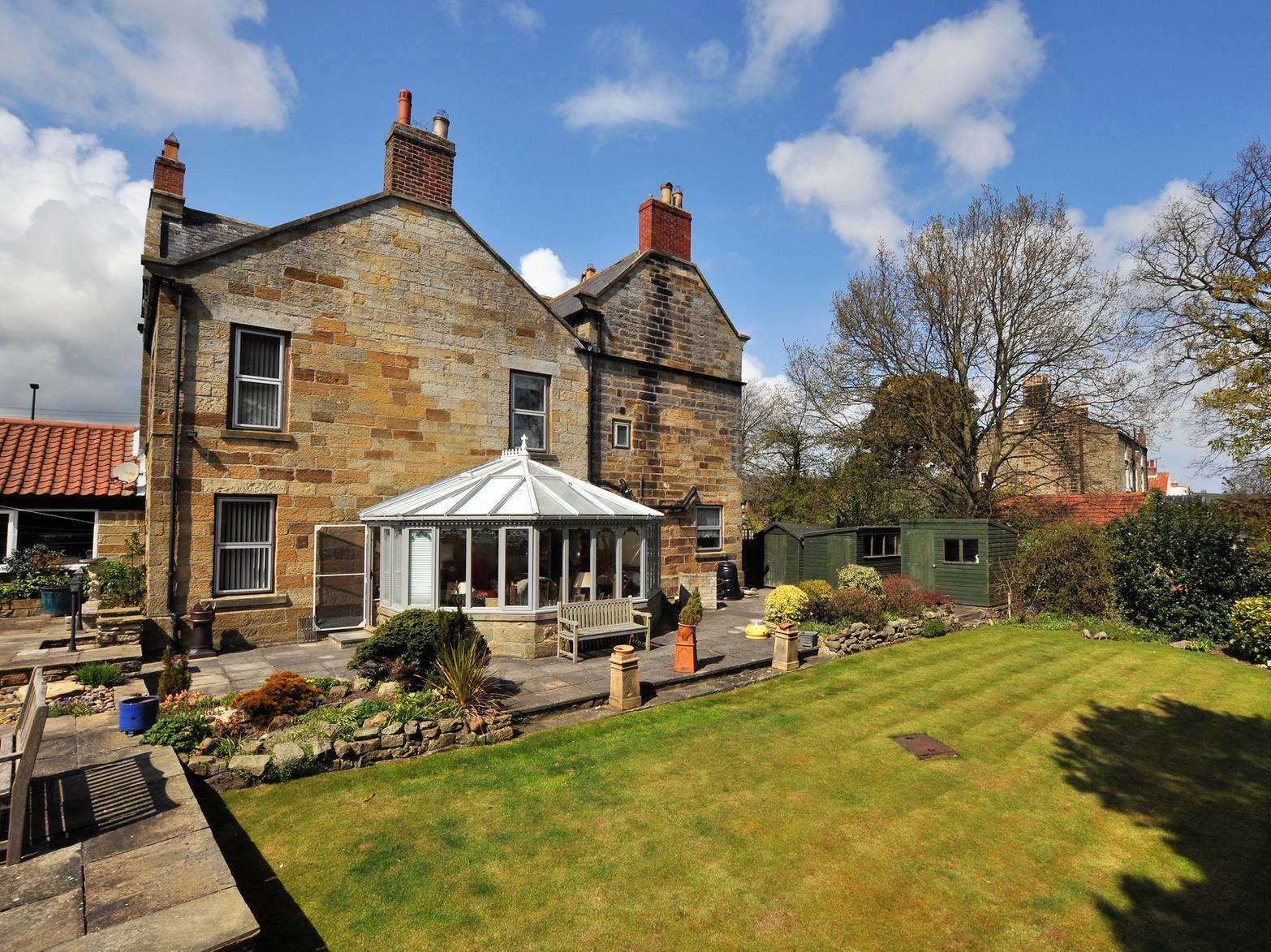 Rear view of The Old Vicarage with the conservatory