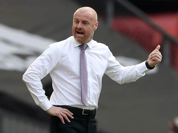 Burnley's English manager Sean Dyche gestures on the touchline during the English Premier League football match between Manchester United and Burnley at Old Trafford in Manchester, north west England, on April 18, 2021.