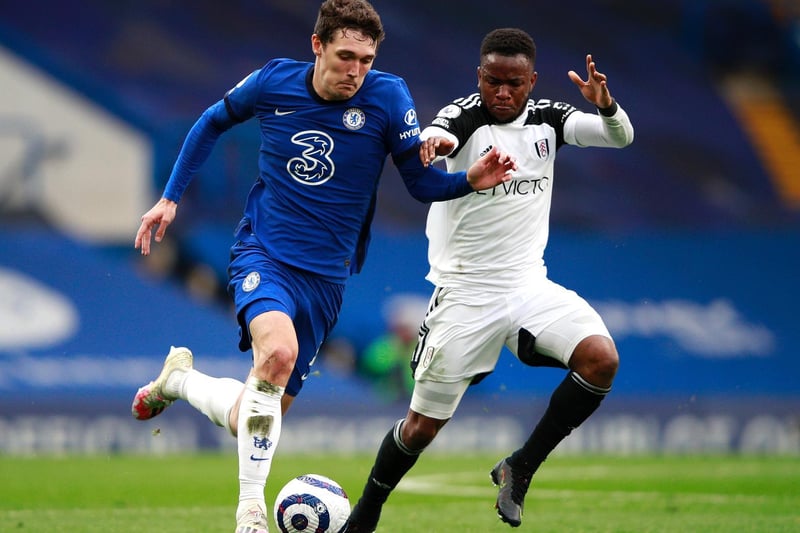 Andreas Christensen of Chelsea and Ademola Lookman of Fulham battle for the ball during the Premier League match between Chelsea and Fulham at Stamford Bridge on May 01, 2021 in London, England.