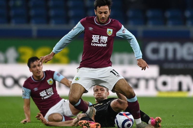 Burnley's English midfielder Dwight McNeil is tackled by West Ham United's Czech midfielder Tomas Soucek during the English Premier League football match between Burnley and West Ham United at Turf Moor in Burnley, north west England, on May 3, 2021.