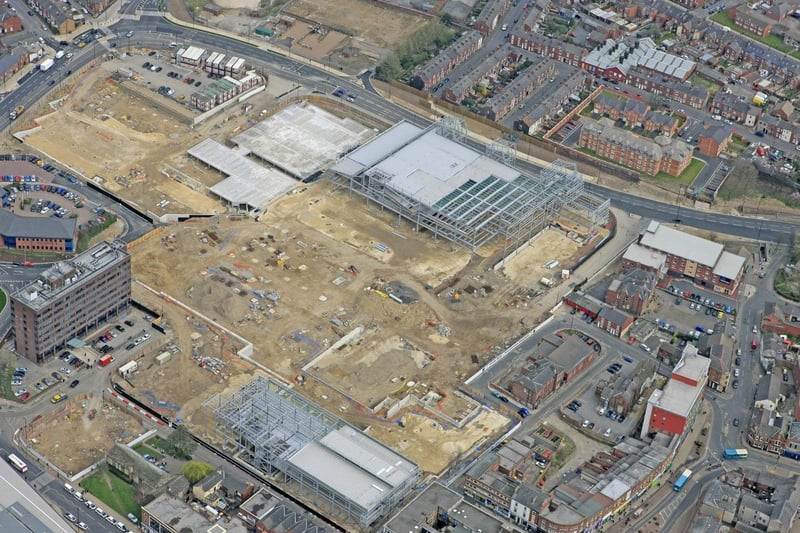 The area now known as Trinity Walk was originally comprised of largely derelict land, though some businesses, including the 150-year-old Tut ‘n’ Shive pub, were demolished to make way for the centre.