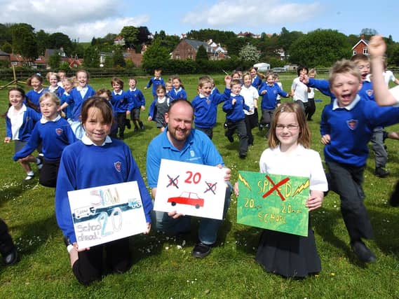 Ruswarp children get their pictures placed on speeding signs.