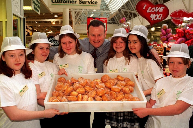 Pupils from Intake High are pictured with Pudsey ASDA store manager Richard Woodhall as part of the 'Kids At Work' initiative in February 1997.
