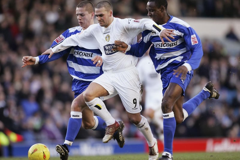 David Healy battles past Reading's Ibrahima Sonko and Ivar Ingimarsson  on his way to scoring during the Championship clash at Elland Road in February 2005.