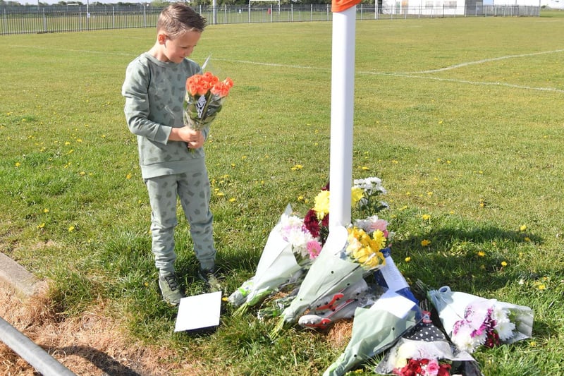 There are heartbreaking scenes at the Common Edge playing fields today (May 12) as children and their parents leave tributes to local boy Jordan Banks who was tragically killed by lightning whilst playing football. Picture by Dave Nelson