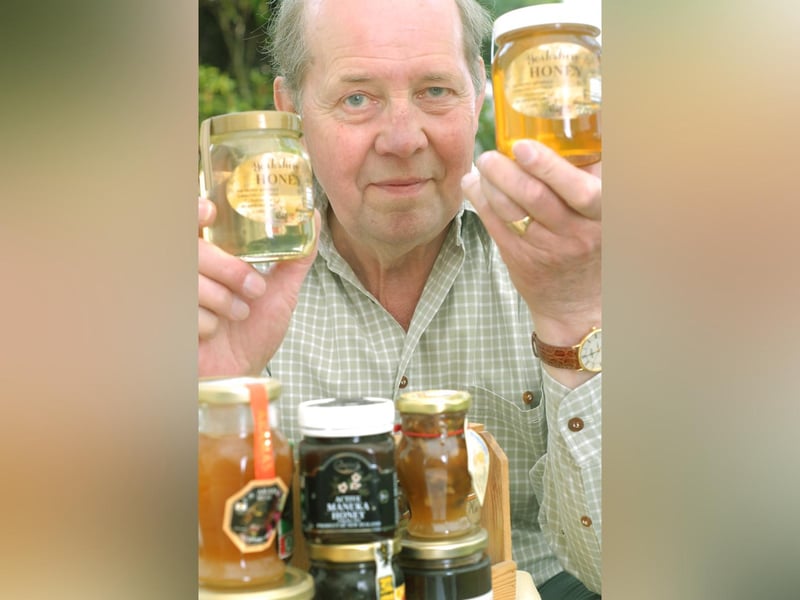 Scarborough beekeeper Peter Chapmans with two of his own honey products.