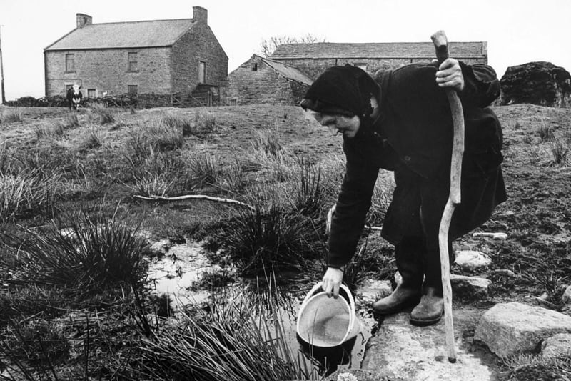 Hannah Hauxwell drawing her water for domestic use at her farm in Baldersdale in the early 1980s