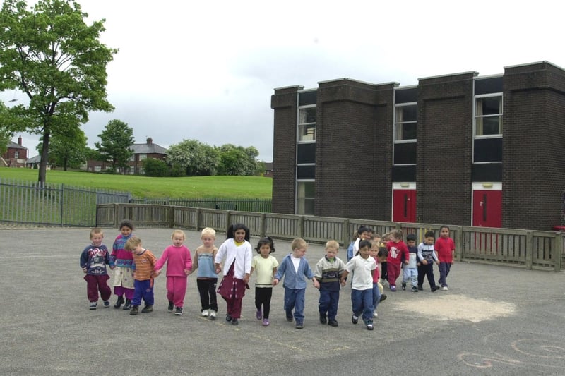Nursery schoolchildren in the playground at St Bartholomew's Primary in Armley which was set to be revamped.
