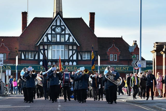 The St Annes Remembrance parade heads from the pier towards the ceremony at Ashton Gardens. Picture: Adam Gee.