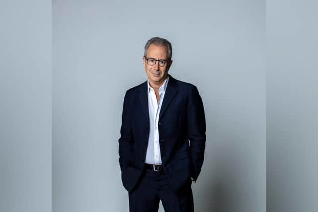 Comedian Ben Elton is directing the musical We Will Rock You which heads off on tour next year
