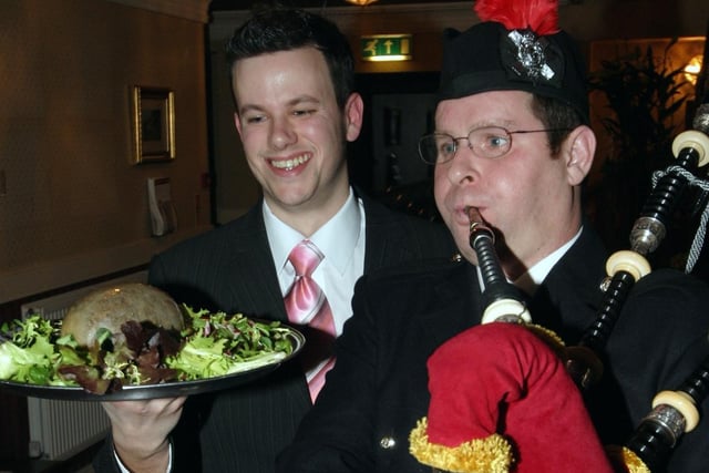 Burns Night at the Cottingham Hunting Lodge in 2006, with Alan Stewart piping and Tim Meeks carrying the haggis