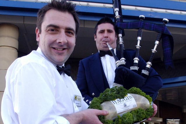 Morrisons manager David Handy with Grampian Pipe Band Pipe Major Rob Muir back in 2007
