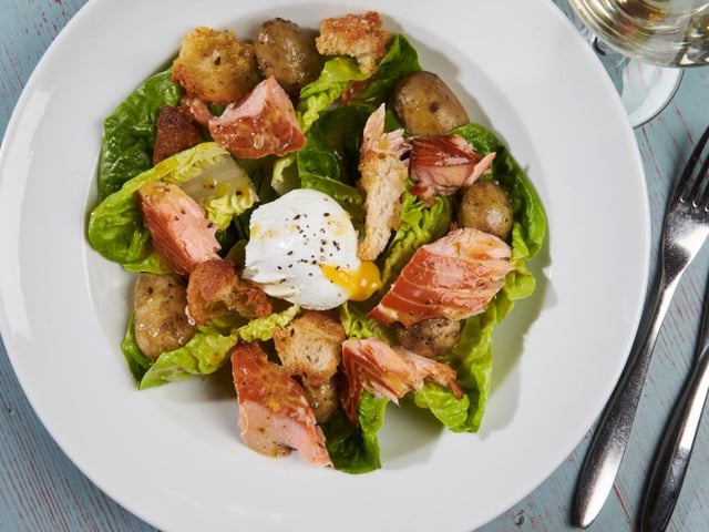 A popular main at The Red Lion: salmon salad with poached egg and croutons. Photo: The Red Lion